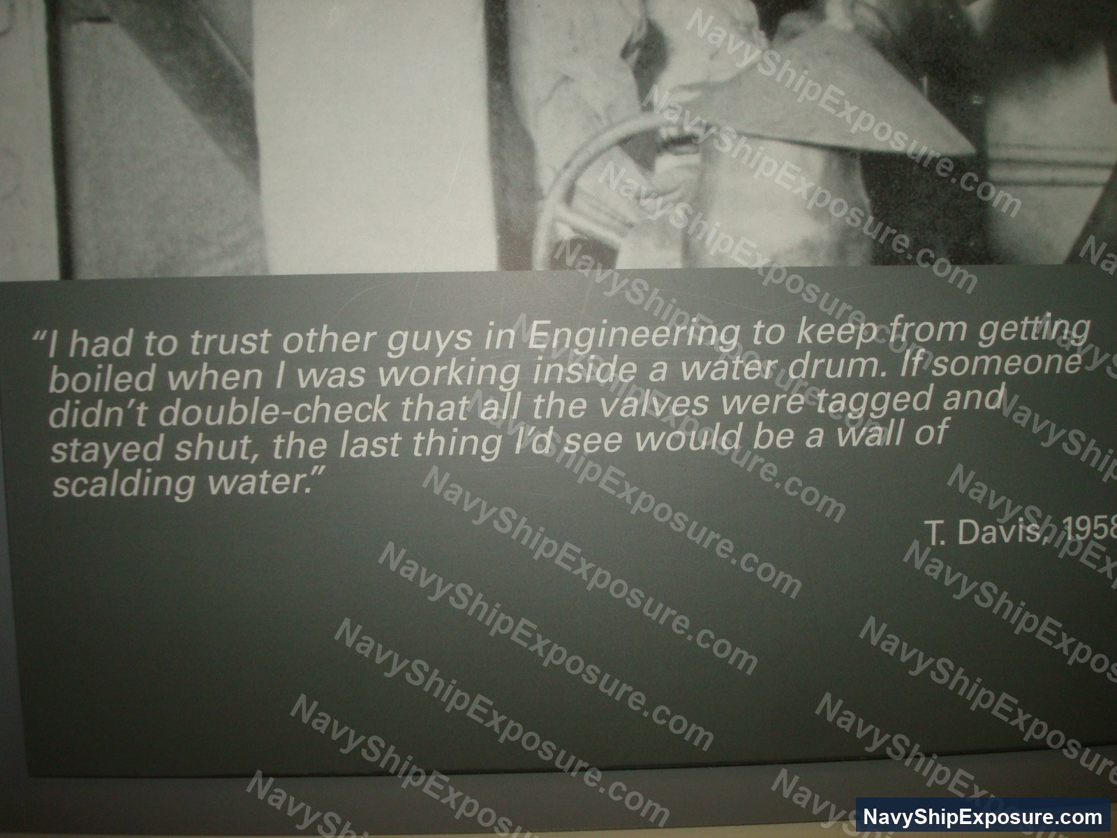 A museum or historical exhibit panel featuring a 1955 testimonial quote from T. Davis describing the hazardous conditions of working inside a water drum in Engineering, emphasizing the critical safety protocols required to prevent scalding injuries.